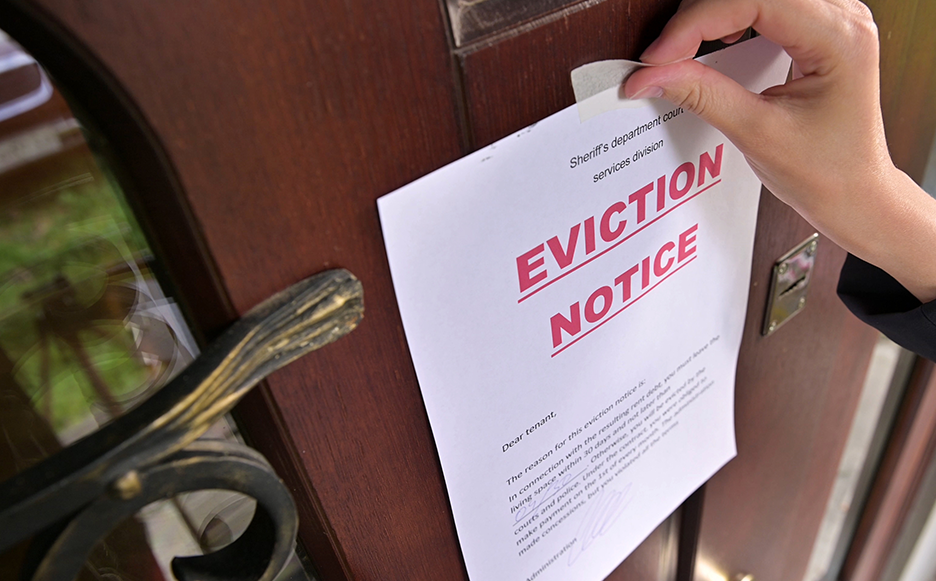 paper eviction notice on door